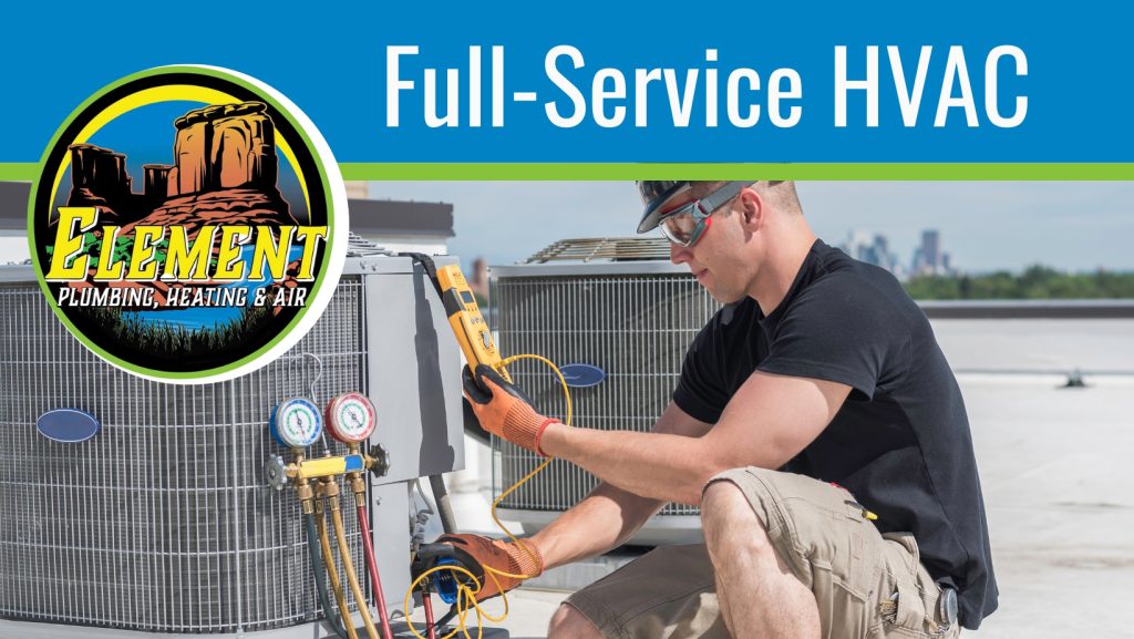 Element-HVAC-technician-servicing-AC-unit---Heating-and-cooling-services-St.-George-Utah